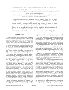 Erbium-implanted high-Q silica toroidal microcavity laser